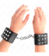 KINK - MUÑEQUERAS CON CIERRE A PRESIÓN AJUSTABLE NEGRO 19-24 CM X 5.5 CM